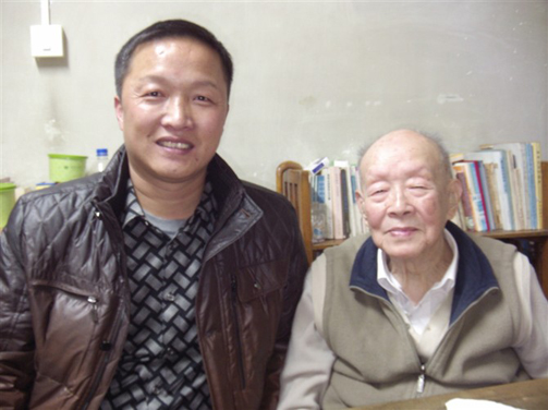 李国辉与周友光合影