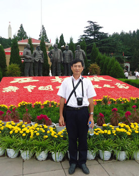 严坤明