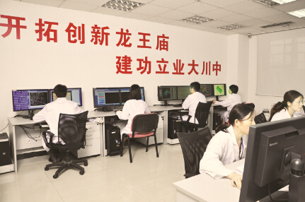 ●终年繁忙的解释工作机房 凌征翔/摄