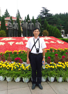 严坤明
