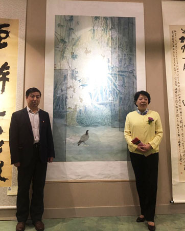 户广生老师与泉州市副市长周真平合影