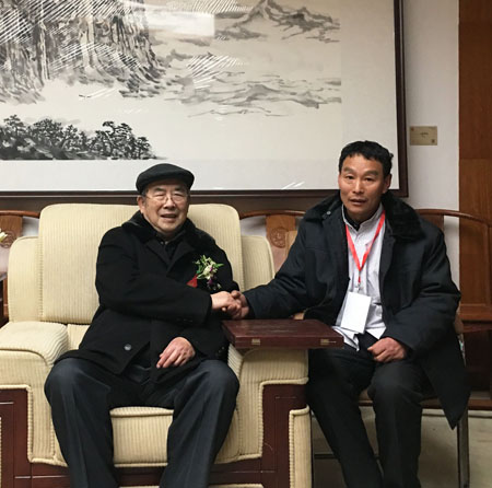 权希军老师与李海圣会见合影