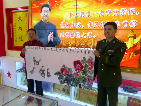 著名艺术家张少石走进礼炮部队参观慰问