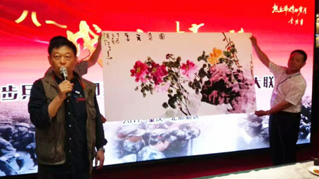 书画大家何文军挥毫赠南疆猛虎团 书画大家何文军挥毫赠南疆猛虎团