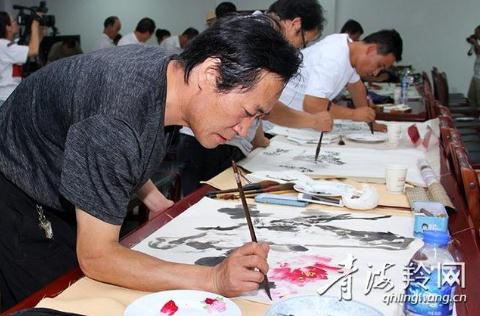 甘青两地书画家开展笔会交流活动